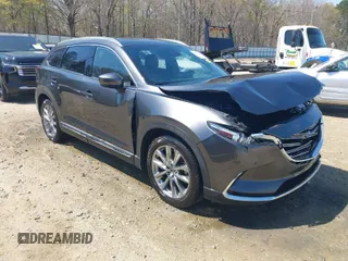 2019 Mazda CX-9 Signature with VIN JM3TCBEY8K0313614, listed as a IAAI auction lot 41894443 with 56,877 mi miles. Bid and sale history available at carsss.com. Image 1.