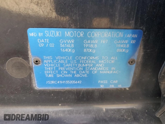 2003 Suzuki Aerio SX z VIN JS2RC41H135205642, wystawiony jako Copart lot #77690224 z przebiegiem 161 414 mil mil oraz Szkoda całkowita • Salvage title. Historia ofert i sprzedaży dostępna na DreamBid. Obrazek 15.