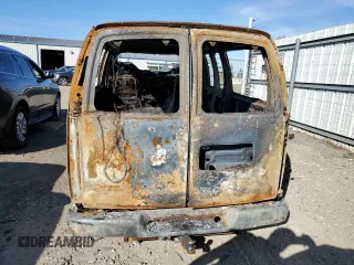 2002 GMC Savana z VIN 1GDFG65R221107446, wystawiony jako Copart lot #76991664 z przebiegiem Nie podano mil oraz Czysty tytuł • Clean title. Historia ofert i sprzedaży dostępna na DreamBid. Obrazek 6.