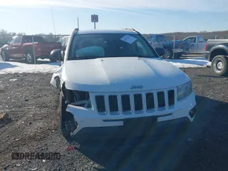 2014 Jeep Compass Altitude with VIN 1C4NJCBA4ED775315, listed as a IAAI auction lot 41429259 with 148,064 mi miles. Bid and sale history available at carsss.com. Image 6.