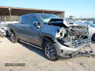 2024 GMC Sierra 1500 with VIN 1GTPHGE89RZ120273, listed as a IAAI auction lot 40288504 with 24,296 mi miles and . Bid and sale history available at DreamBid. Image 1.