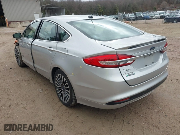 2017 Ford Fusion Titanium with VIN 3FA6P0SU2HR153423, listed as a IAAI auction lot 42029438 with 106,596 mi miles and . Bid and sale history available at DreamBid. Image 3.