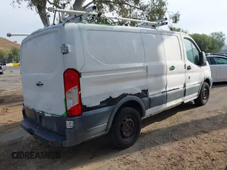 2015 Ford Transit Cargo with VIN 1FTNE1ZM6FKA63779, listed as a IAAI auction lot 41367212 with 208,866 mi miles and . Bid and sale history available at carsss.com. Image 4.