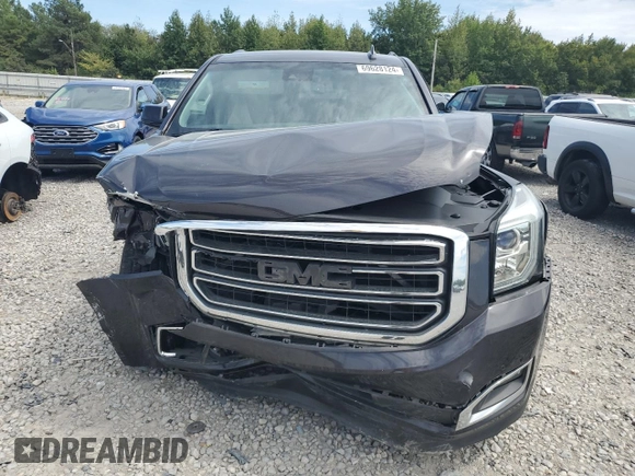 2015 GMC Yukon XL SLE z VIN 1GKS1GKC2FR625157, wystawiony jako Copart lot #69628124 z przebiegiem 153 022 mil mil oraz Szkoda całkowita • Salvage title. Historia ofert i sprzedaży dostępna na DreamBid. Obrazek 5.