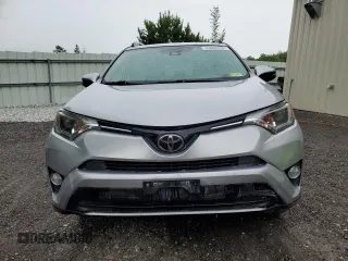 2018 Toyota RAV4 XLE with VIN JTMRFREV2JJ200677, listed as a Copart auction lot 59660535 with 82,283 mi miles and Salvage title. Bid and sale history available at DreamBid. Image 5.