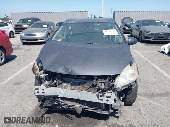 2012 Toyota Prius One z VIN JTDKN3DU1C1523891, wystawiony jako IAAI lot #42372948 z przebiegiem 219 017 mil mil oraz . Historia ofert i sprzedaży dostępna na DreamBid. Obrazek 12.