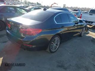 2019 BMW 5 Series 530e with VIN WBAJA9C57KB399541, listed as a IAAI auction lot 41656775 with 96,523 mi miles and . Bid and sale history available at DreamBid. Image 4.