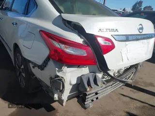 2016 Nissan Altima SV with VIN 1N4AL3APXGC193085, listed as a IAAI auction lot 41507049 with 105,058 mi miles and . Bid and sale history available at DreamBid. Image 6.