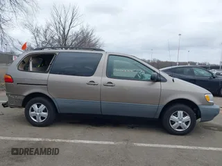 1999 Toyota Sienna LE with VIN 4T3ZF13C5XU121145, listed as a IAAI auction lot 41721171 with 229,760 mi miles and . Bid and sale history available at DreamBid. Image 13.