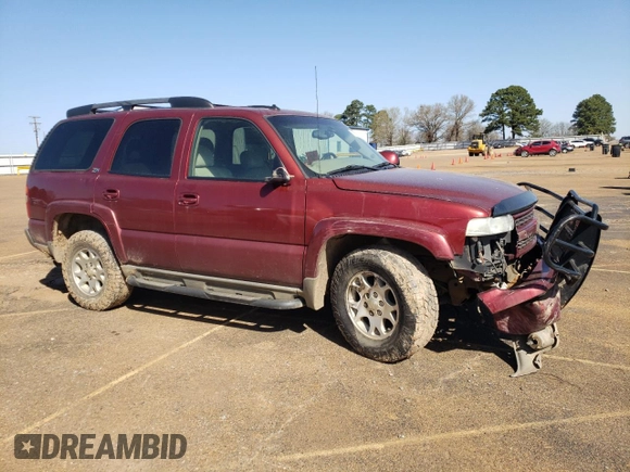 2003 Chevrolet Tahoe LS with VIN 1GNEK13Z93R256421, listed as a Copart auction lot 49001975 with 318,219 mi miles and Salvage Title. Bid and sale history available at DreamBid. Image 4.