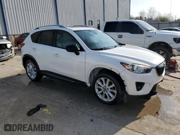 2014 Mazda CX-5 Grand Touring with VIN JM3KE4DY3E0327895, listed as a Copart auction lot 51073305 with 233,938 mi miles and Non Repairable. Bid and sale history available at carsss.com. Image 4.