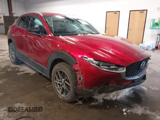 2022 Mazda CX-30 2.5 Turbo Premium Package with VIN 3MVDMBDY6NM459215, listed as a IAAI auction lot 41504357 with 13,757 mi miles. Bid and sale history available at carsss.com. Image 1.