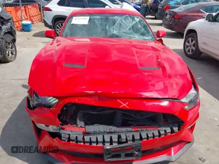 2020 Ford Mustang EcoBoost with VIN 1FA6P8THXL5111643, listed as a IAAI auction lot 42223704 with 59,170 mi miles and . Bid and sale history available at DreamBid. Image 6.