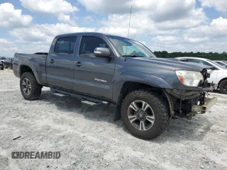 2015 Toyota Tacoma with VIN 3TMMU4FN1FM073755, listed as a Copart auction lot 59657105 with 114,193 mi miles and Salvage title. Bid and sale history available at DreamBid. Image 4.