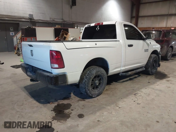2014 Ram 1500 Express with VIN 3C6JR6AG7EG310097, listed as a IAAI auction lot 41409343 with 134,140 mi miles and . Bid and sale history available at DreamBid. Image 4.