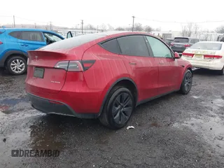 2024 Tesla Model Y Long Range with VIN 7SAYGAEE7RF133073, listed as a IAAI auction lot 41081463 with Not Provided miles and . Bid and sale history available at DreamBid. Image 4.
