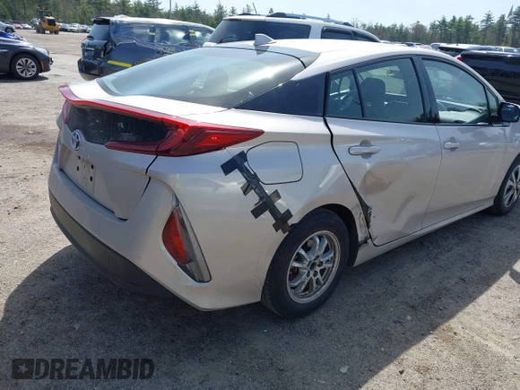 2018 Toyota Prius Plus with VIN JTDKARFP5J3091877, listed as a IAAI auction lot 42129355 with 48,736 mi miles and . Bid and sale history available at DreamBid. Image 4.