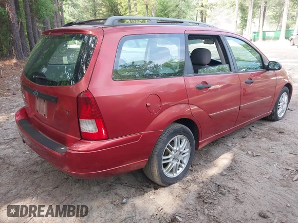 2003 Ford Focus SE Fleet z VIN 1FAFP36333W157750, wystawiony jako IAAI lot #42418479 z przebiegiem 73 273 mil mil oraz . Historia ofert i sprzedaży dostępna na DreamBid. Obrazek 4.