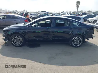 2018 Ford Fusion Titanium with VIN 3FA6P0RU6JR115236, listed as a IAAI auction lot 42111343 with 106,858 mi miles and . Bid and sale history available at DreamBid. Image 15.