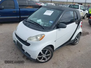 2010 Smart fortwo Pure with VIN WMEEJ3BA5AK390904, listed as a IAAI auction lot 41688922 with Not provided miles and . Bid and sale history available at DreamBid. Image 2.