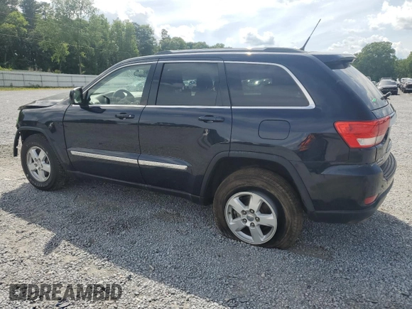 2011 Jeep Grand Cherokee Laredo with VIN 1J4RR4GG7BC515001, listed as a Copart auction lot 56432905 with 143,181 mi miles and Salvage title. Bid and sale history available at DreamBid. Image 2.