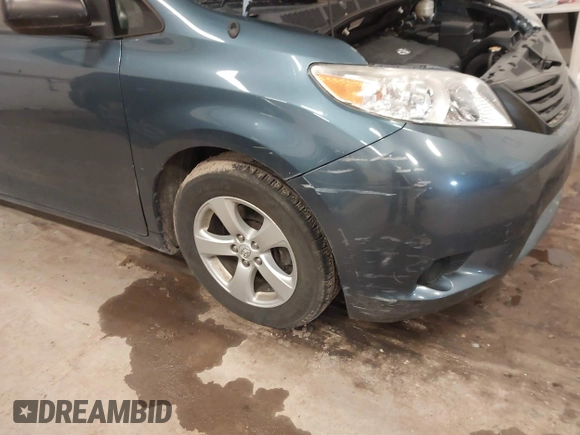 2014 Toyota Sienna L with VIN 5TDZK3DCXES434910, listed as a IAAI auction lot 41731864 with 146,161 mi miles. Bid and sale history available at carsss.com. Image 6.
