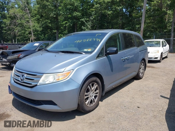 2011 Honda Odyssey EX-L with VIN 5FNRL5H60BB051135, listed as a IAAI auction lot 42588994 with 195,112 mi miles and . Bid and sale history available at DreamBid. Image 2.