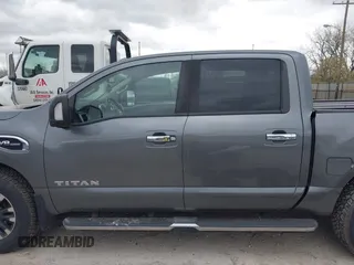 2017 Nissan Titan Platinum Reserve z VIN 1N6AA1E5XHN530256, wystawiony jako IAAI lot #42031654 z przebiegiem 97 200 mil mil oraz . Historia ofert i sprzedaży dostępna na DreamBid. Obrazek 14.
