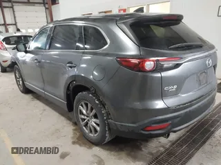 2019 Mazda CX-9 Touring with VIN JM3TCBCY3K0305147, listed as a IAAI auction lot 41676425 with 104,265 mi miles and . Bid and sale history available at carsss.com. Image 3.