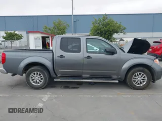 2017 Nissan Frontier SV z VIN 1N6AD0ER4HN759021, wystawiony jako IAAI lot #42459650 z przebiegiem 93 071 mil mil oraz . Historia ofert i sprzedaży dostępna na DreamBid. Obrazek 14.