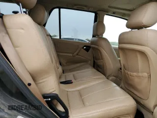 2000 Mercedes-Benz M 320/430/500 z VIN 4JGAB54E3YA209798, wystawiony jako Copart lot #52116575 z przebiegiem Nie podano mil oraz Szkoda całkowita • Salvage title. Historia ofert i sprzedaży dostępna na DreamBid. Obrazek 11.