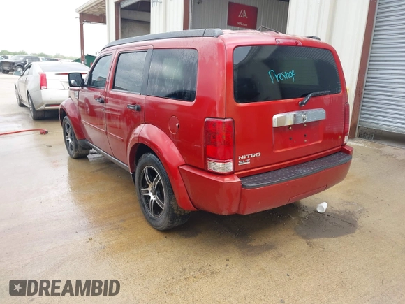 2007 Dodge Nitro SLT with VIN 1D8GT58K77W640112, listed as a IAAI auction lot 42015613 with 220,061 mi miles. Bid and sale history available at carsss.com. Image 3.