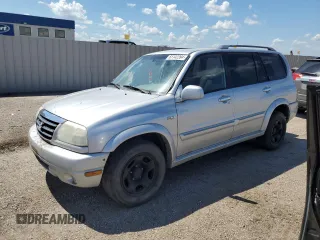 2002 Suzuki XL7 Standard z VIN JS3TX92V224107201, wystawiony jako Copart lot #61142394 z przebiegiem Nie podano mil oraz Szkoda całkowita • Salvage title. Historia ofert i sprzedaży dostępna na DreamBid. Obrazek 1.