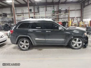 2011 Jeep Grand Cherokee Overland with VIN 1J4RR6GTXBC701186, listed as a IAAI auction lot 41553697 with 172,317 mi miles. Bid and sale history available at carsss.com. Image 13.