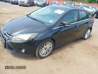 2014 Ford Focus Titanium with VIN 1FADP3N2XEL319782, listed as a IAAI auction lot 42615481 with 132,423 mi miles and . Bid and sale history available at DreamBid. Image 2.