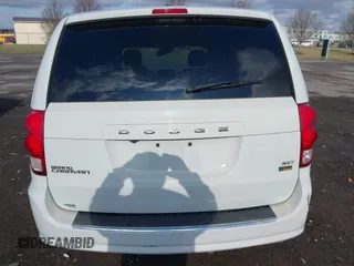 2019 Dodge Grand Caravan SXT with VIN 2C4RDGCG4KR771745, listed as a IAAI auction lot 41859267 with 97,436 mi miles and . Bid and sale history available at DreamBid. Image 16.