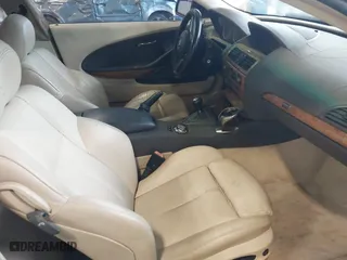 2004 BMW 6 Series 645Ci with VIN WBAEH73484B215624, listed as a IAAI auction lot 41935005 with 125,780 mi miles. Bid and sale history available at carsss.com. Image 5.