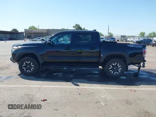 2021 Toyota Tacoma SR z VIN 3TMCZ5AN3MM421868, wystawiony jako IAAI lot #42003665 z przebiegiem 39 380 mil mil oraz . Historia ofert i sprzedaży dostępna na DreamBid. Obrazek 14.