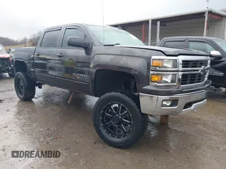2015 Chevrolet Silverado 1500 LT with VIN 3GCUKRECXFG104194, listed as a IAAI auction lot 41029090 with 149,530 mi miles and . Bid and sale history available at DreamBid. Image 1.