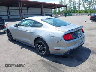 2020 Ford Mustang EcoBoost with VIN 1FA6P8TH0L5136647, listed as a IAAI auction lot 41998365 with 100,054 mi miles. Bid and sale history available at carsss.com. Image 3.