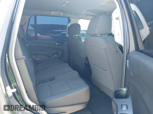 2020 Chevrolet Tahoe LS with VIN 1GNSCAKC4LR293082, listed as a IAAI auction lot 42663985 with 143,114 mi miles and . Bid and sale history available at DreamBid. Image 8.