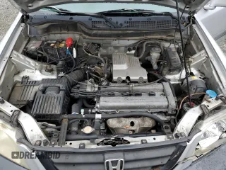 1999 Honda CR-V EX with VIN JHLRD1866XC074271, listed as a Copart auction lot 68741914 with 296,297 mi miles and Salvage Title. Bid and sale history available at carsss.com. Image 14.