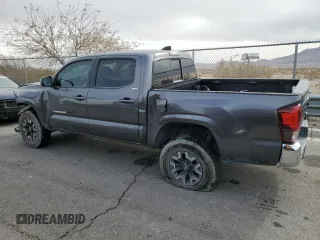 2021 Toyota Tacoma SR with VIN 3TYAX5GN7MT021255, listed as a Copart auction lot 42616935 with 64,626 mi miles and Salvage title. Bid and sale history available at DreamBid. Image 2.