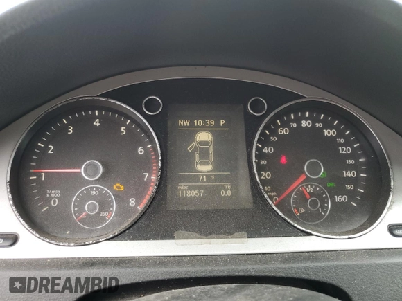 2009 Volkswagen Passat z VIN WVWXK73C39E138994, wystawiony jako Copart lot #70876274 z przebiegiem 118 057 mil mil oraz Czysty tytuł • Clean title. Historia ofert i sprzedaży dostępna na DreamBid. Obrazek 9.