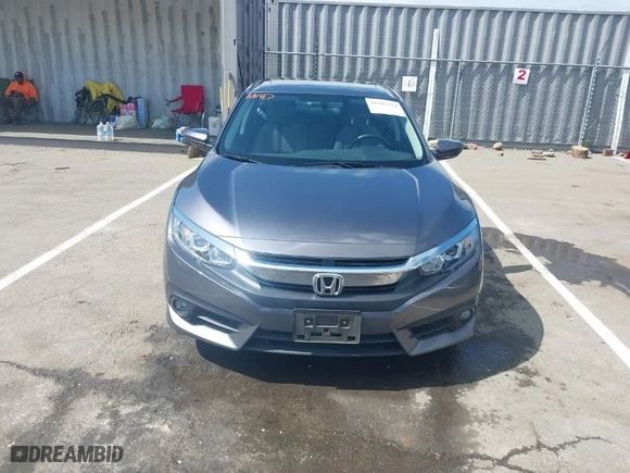 2018 Honda Civic Sedan EX-T with VIN JHMFC1F30JX018885, listed as a IAAI auction lot 41905534 with 94,560 mi miles. Bid and sale history available at carsss.com. Image 13.
