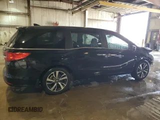 2021 Honda Odyssey Touring with VIN 5FNRL6H84MB009125, listed as a Copart auction lot 58248385 with 55,360 mi miles and Salvage title. Bid and sale history available at DreamBid. Image 3.