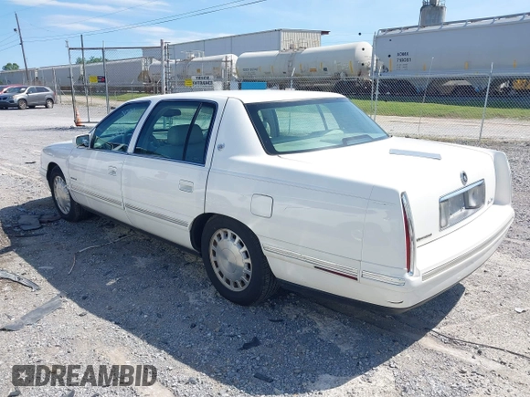 1999 Cadillac DeVille z VIN 1G6KD54Y3XU712969, wystawiony jako IAAI lot #42344041 z przebiegiem 169 572 mil mil oraz . Historia ofert i sprzedaży dostępna na DreamBid. Obrazek 3.