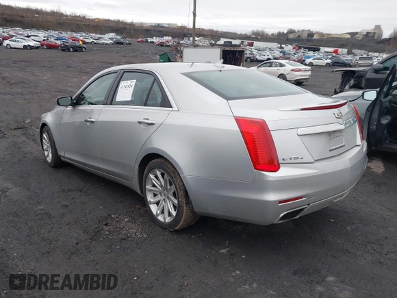 2014 Cadillac CTS Luxury AWD z VIN 1G6AX5SX3E0194895, wystawiony jako IAAI lot #41741824 z przebiegiem 197 042 mil mil oraz . Historia ofert i sprzedaży dostępna na DreamBid. Obrazek 3.