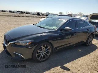 2016 Mazda 6 i Grand Touring с VIN JM1GJ1W56G1473572, выставлен на аукционе Copart как лот 48655935 с пробегом 144 016 миль миль и Списание • Salvage title. История ставок и продаж доступна на DreamBid. Изображение 1.