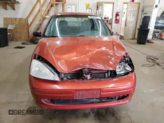 2000 Ford Focus SE with VIN 1FAFP343XYW397386, listed as a Copart auction lot 52828655 with 237,885 mi miles and Salvage Title. Bid and sale history available at carsss.com. Image 5.